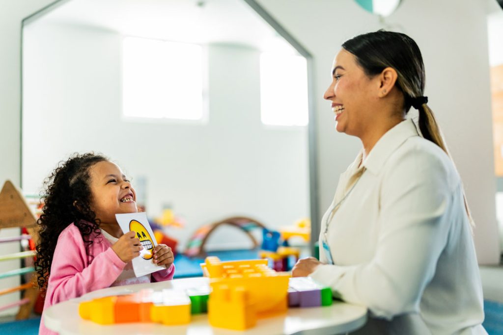 school counselor helping student figure out what her feelings are during session