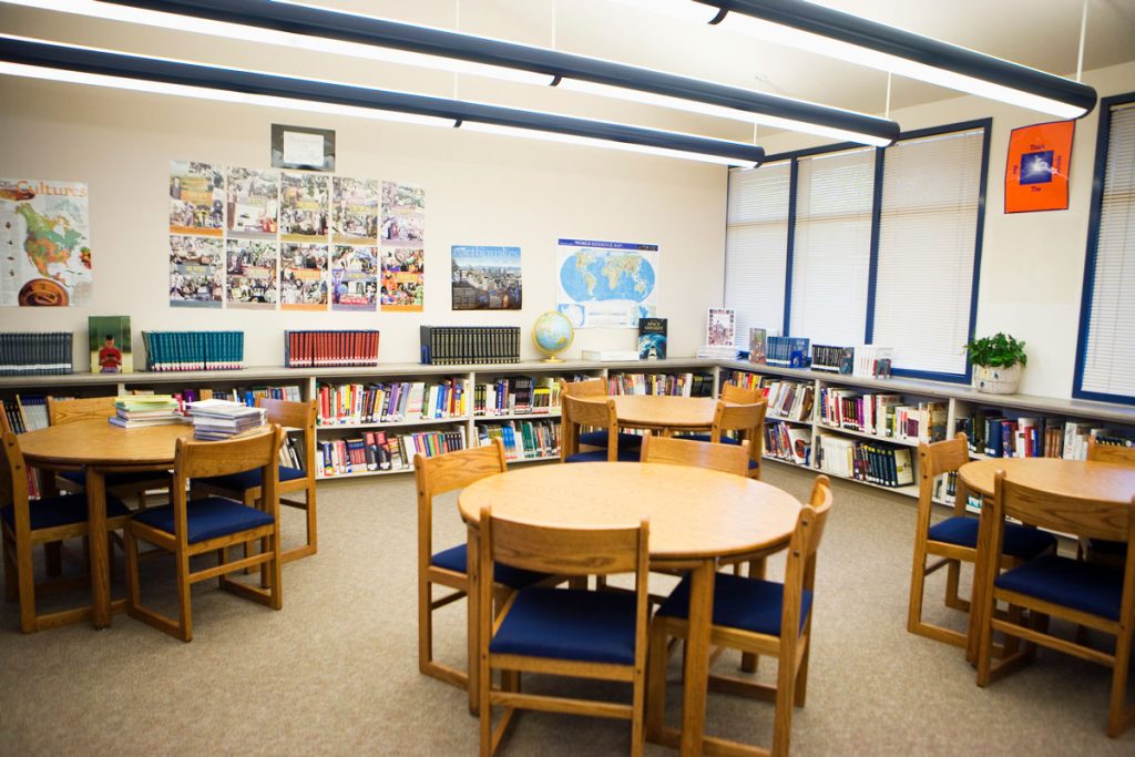 school library with circle desks and chairs